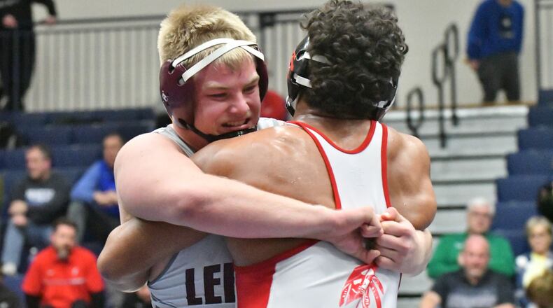 Colton Quantz of Lebanon battles Brandon Smith of Fairfield in the Division I district tournament at Trent Arena in Kettering. Greg Billing/Contributed