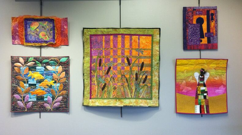 The Contemporary Quilt and Fiber Artist’s exhibition showcases 31 pieces, including different styles of patchwork, free-motion quilting, hand stitching, thread painting, polymer clay additions, hand-dyed fabrics and stamping. CONTRIBUTED