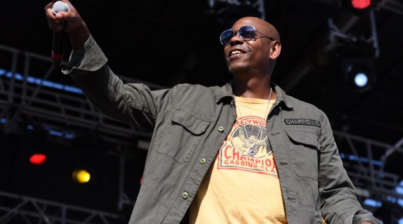 Dave Chappelle on stage for the Gem City Shine event.
Photo by: Tom Gilliam
