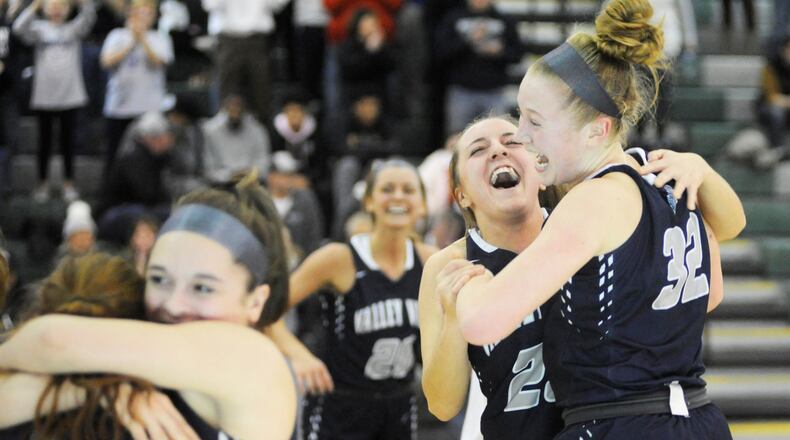 Jayna Black and Aubrey Stupp (right) of Valley View celebrate. Valley View defeated Cincinnati Roger Bacon 69-58 in a D-II girls high school basketball district final at Mason on Friday, March 1, 2019. MARC PENDLETON / STAFF