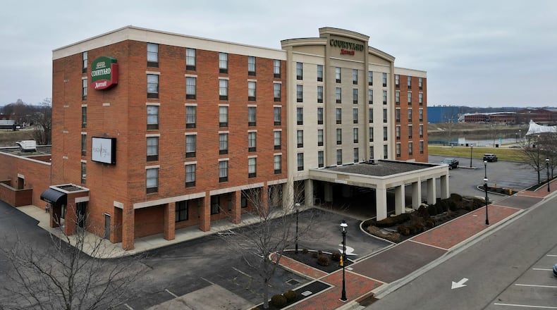 Pictured is the Courtyard by Marriott Hamilton in the city's downtown on Tuesday morning, Feb. 6 2024. Dublin-based developer Crawford Hoying purchased the hotel in partnership with Shaner Hotel Group, which is just south of the near-18-acre development at the former Cohen Recycling plant at the corner of Third and Black streets. NICK GRAHAM/STAFF