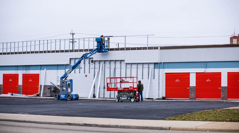 Workers have been putting on the finishing touches for the new U-Haul Storage facility at 2436 N. Verity Parkway. The new 450-unit storage facility offers 24/7 access to its climate-controlled indoor units and its outdoor storage unit and offers high-tech security features. NICK GRAHAM/STAFF