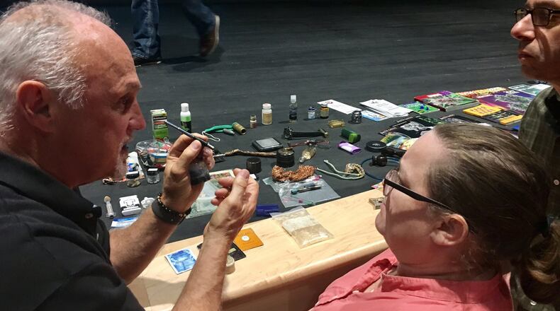 Sgt. Michael Powell of Operation: Street Smart, a Franklin County Sheriff’s Office program, shows those who attended a late 2017 presentation organized by Fairfield Prevention Coalition how to detect various items used to hide alcohol, tobacco, over-the-counter medications, and illicit drugs like marijuana, cocaine and heroin. ERIC SCHWARTZBERG/STAFF