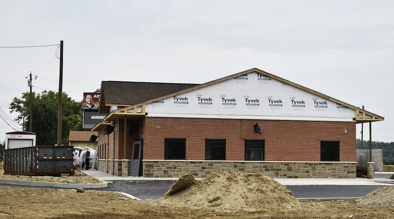 Construction on the new medical pot emporium in Seven Mile continues Monday, August 12. When completed, this will be one of two dispensaries in Butler County. The other dispensary will be located in Monroe. NICK GRAHAM/STAFF
