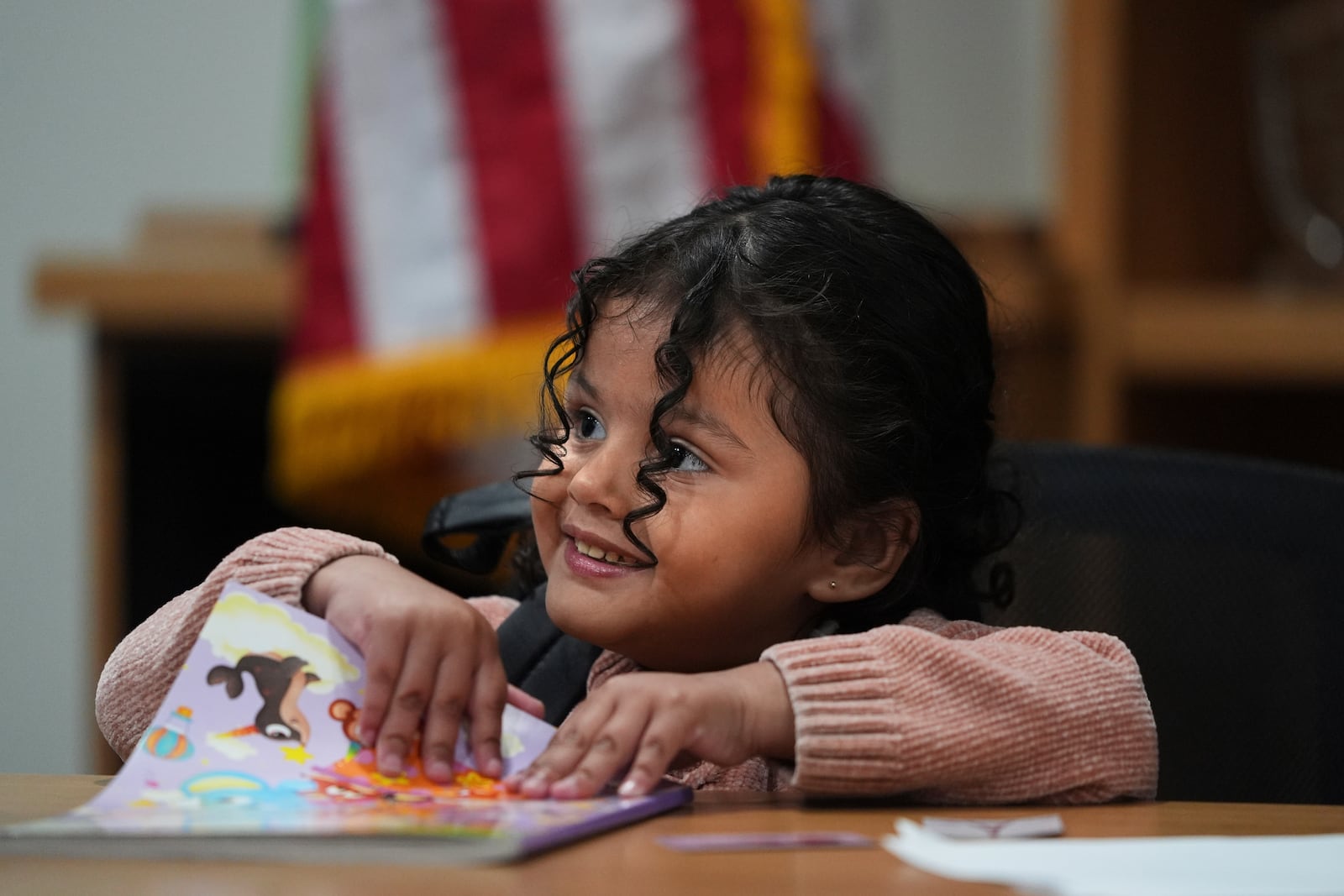 A 4-year-old Mexican girl, who has short bowel syndrome, attends a news conference in Los Angeles, Wednesday, May 28, 2025, after her and her mother's humanitarian parole was terminated and they were ordered to self-deport. (AP Photo/Jae C. Hong)
