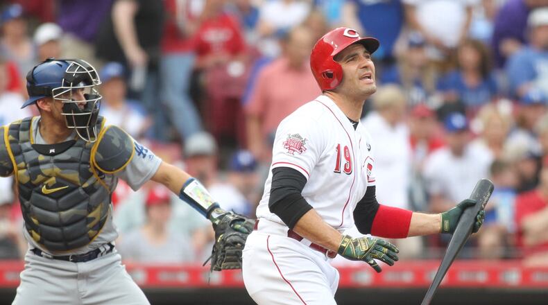 The Reds’ Joey Votto reacts after striking out in the first inning against the Dodgers on Friday, May 17, 2019, at Great American Ball Park in Cincinnati. David Jablonski/Staff