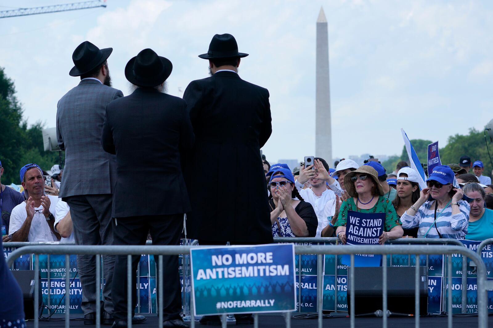 FILE - People attend the "NO FEAR: Rally in Solidarity with the Jewish People" event in Washington, Sunday, July 11, 2021, co-sponsored by the Alliance for Israel, Anti-Defamation League, American Jewish Committee, B'nai B'rith International and other organizations. (AP Photo/Susan Walsh, File)