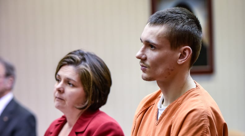 Derrick Brown is shown in court with his attorney Melynda Cook Howard. He was sentenced to 51 years to life in prison for the November shooting death of Joe Romano at his Middletown home and other felony charges, including participating in a criminal gang. NICK GRAHAM/STAFF