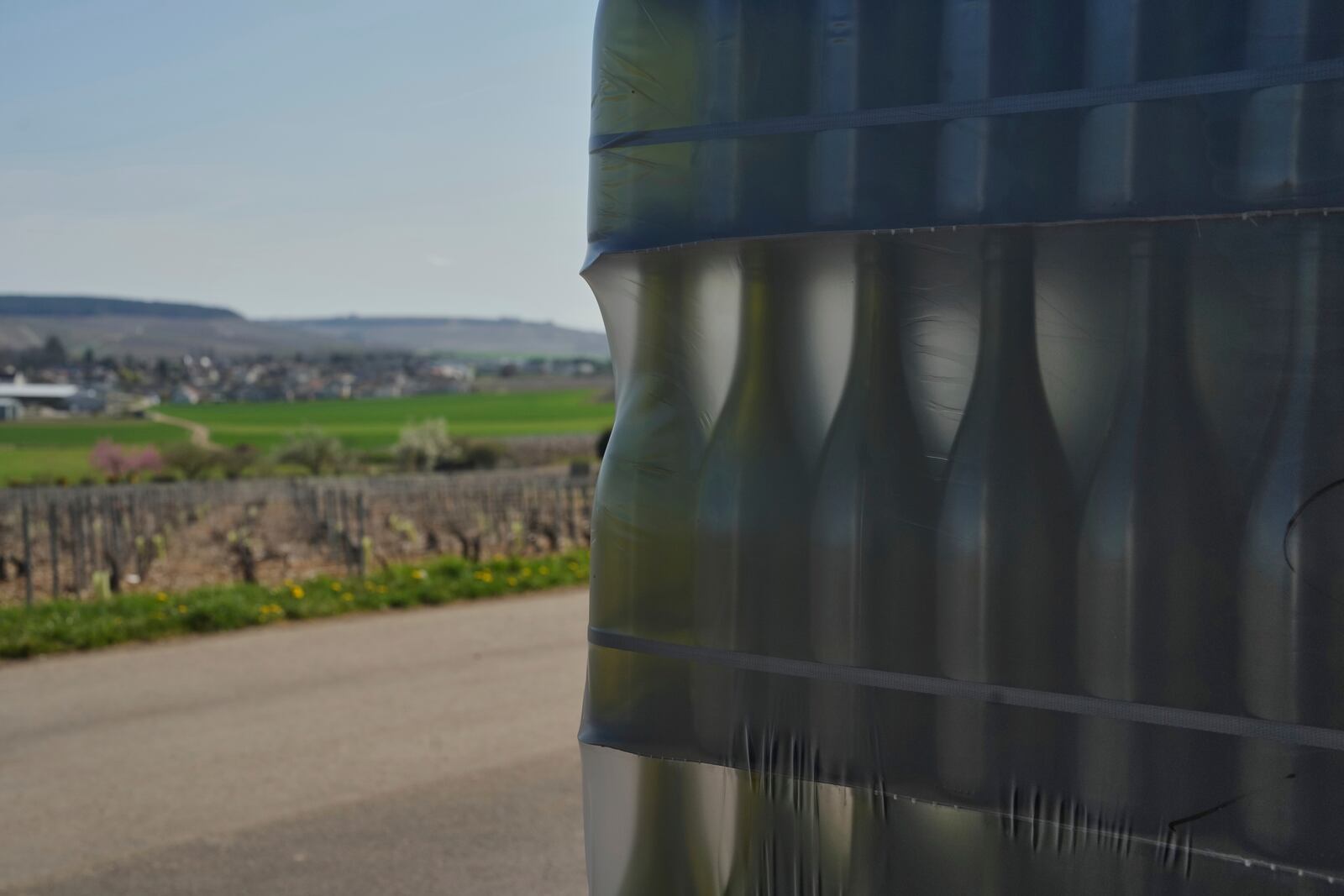 Bottles of Chablis wine are stored at the wine making facility of winegrower Vincent Dampt, in Chablis, Burgundy region, eastern France, Thursday, April 3, 2025. (AP Photo/Thibault Camus)