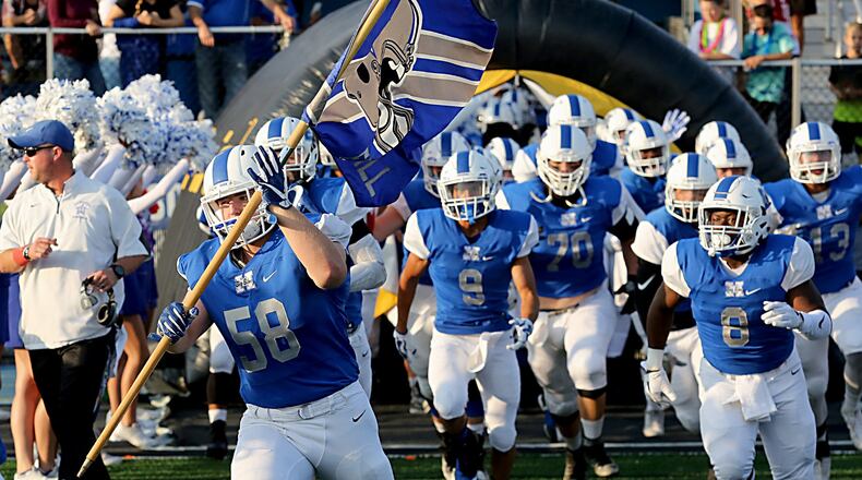 The Hamilton Big Blue take the field for their Skyline Chili Crosstown Showdown game against Moeller at Virgil Schwarm Stadium in Hamilton on Aug. 26. The visiting Crusaders won 42-7. CONTRIBUTED PHOTO BY E.L. HUBBARD