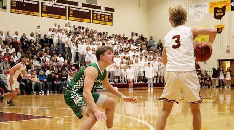 Badin’s Nathan Hegemann guards Dylan Zimmerman of Ross during Saturday night’s game in Ross Township. Badin won 51-38. CONTRIBUTED PHOTO BY TERRI ADAMS