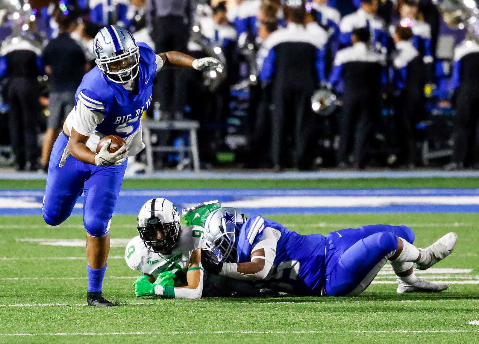 Hamilton's Na'sir Harper carries the ball during their football game against Badin Friday, Aug. 18, 2023 at Hamilton's Virgil Schwarm Stadium. Badin defeated Hamilton 18-0 during the showdown at the Schwarm. This is the first football game between the cross town teams since the year 2000. NICK GRAHAM/STAFF