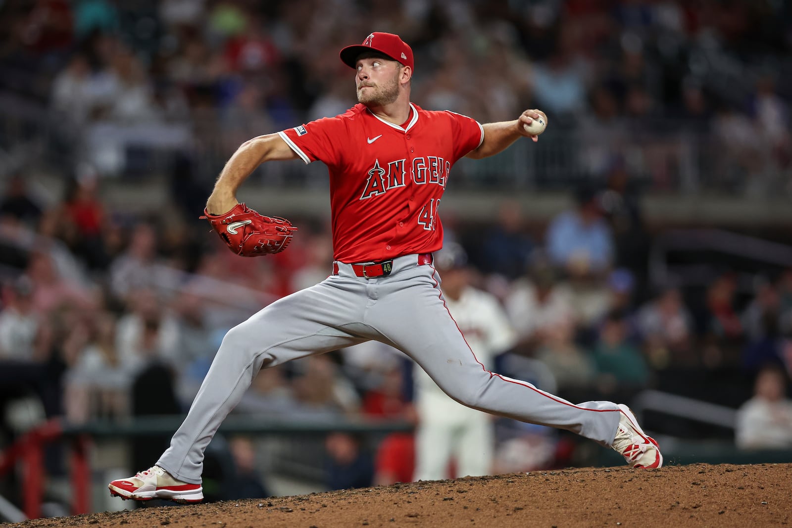 Los Angeles Angels pitcher Reid Detmers delivers in the eighth inning of a baseball game against the Atlanta Braves, Tuesday, July 1, 2025, in Atlanta. (AP Photo/Colin Hubbard)
