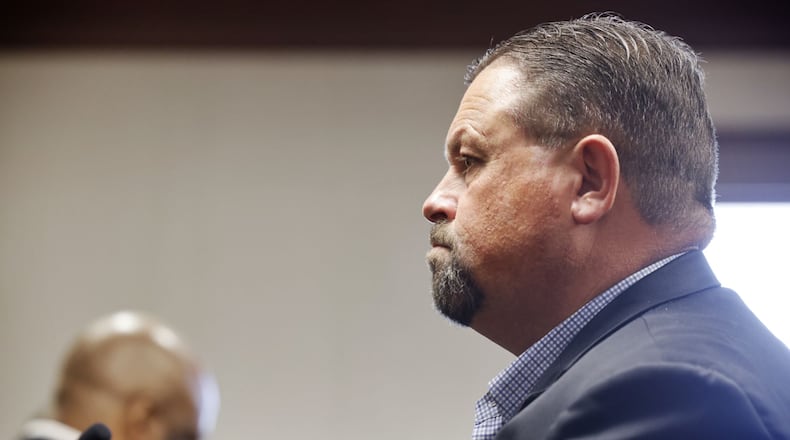 Hamilton attorney Dennis Adams was sentenced Wednesday in Butler County Common Pleas Court after pleading guilty to stealing from two clients. NICK GRAHAM/STAFF