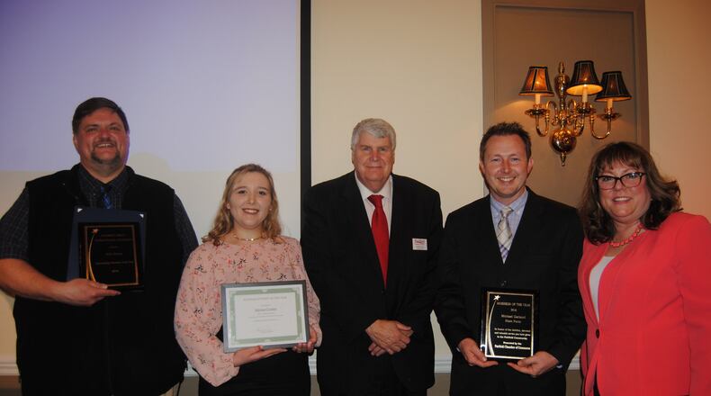 Kyle Himes of Sam’s Club in Springdale (Volunteer of the Year), Alyssa Conley (Business Student of the Year), Fairfield Chamber of Commerce President and CEO Kert Radel, Michael Garland of Michael Garland State Farm Agency (Business of the Year) and Sandra Ambrose Clark, owner of Without a Doubt Truck & Trailer Repair pose for a photograph Thursday, March 31, 2017, during the chamber’s annual awards dinner at Receptions Conference Center. ERIC SCHWARTZBERG STAFF