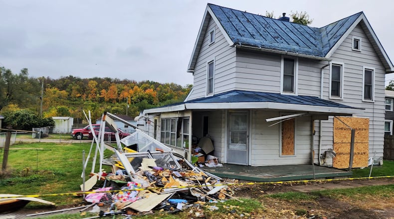 This is the damage done to a house on Oxford State Road after a truck was sideswiped, sending the driver into the house. William "Bill" Miller, 58, of Middletown, died on Oct. 15 at Atrium Medical Center. The at-fault driver has not been charged, according to the Butler County Sheriff's Office. NICK GRAHAM/STAFF