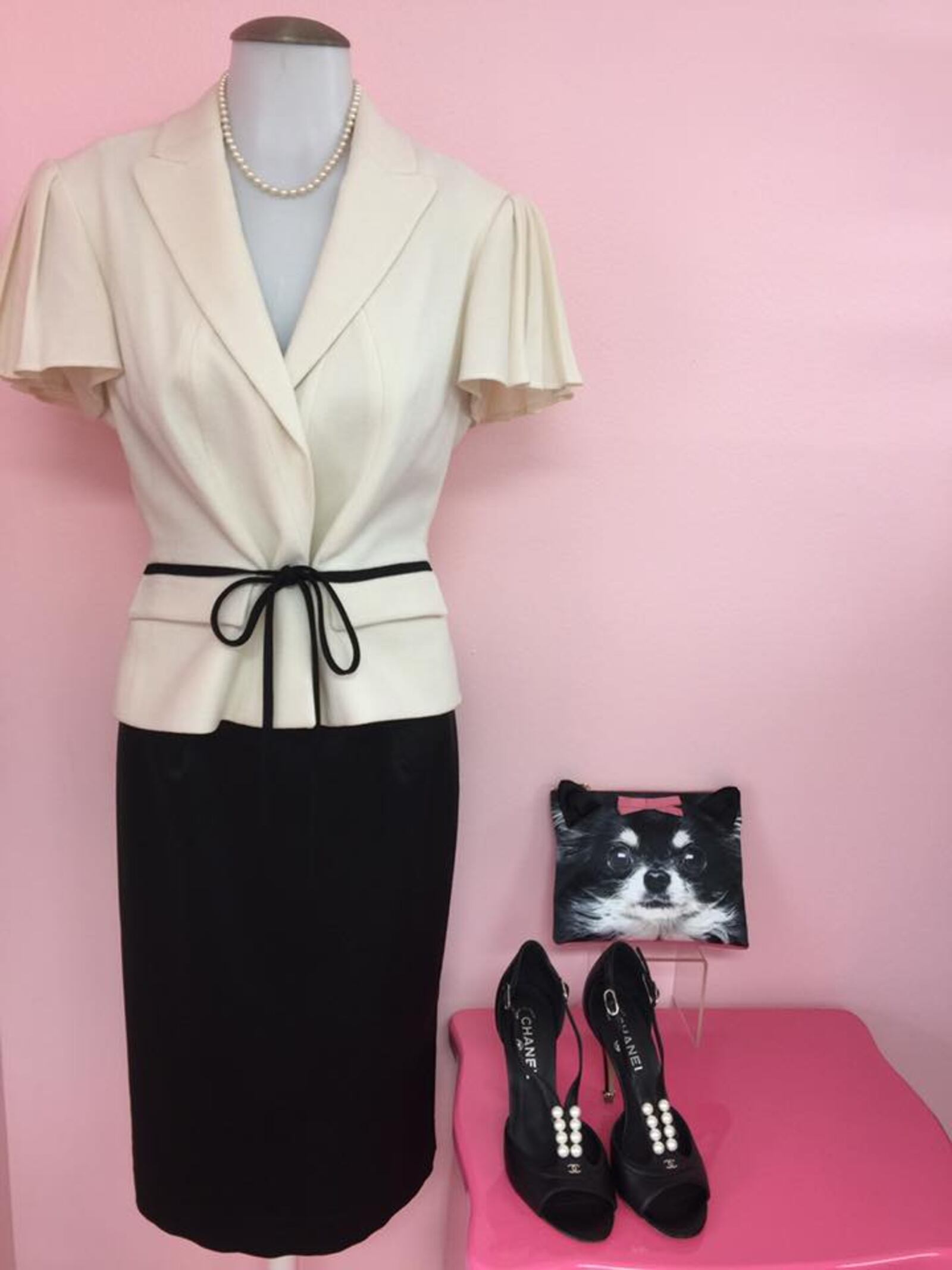 Designers Items and More, located at 8919 Brookside Ave. in West Chester Twp., specializes in high-end, new, pre-owned, and vintage couture designer clothes, and shoes and accessories. 