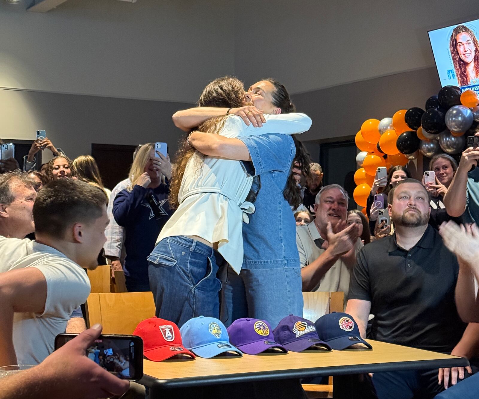 Fairmont grad Maddy Westbeld celebrates WNBA draft in Kettering on April 14, 2025, with her sister, Kathryn.