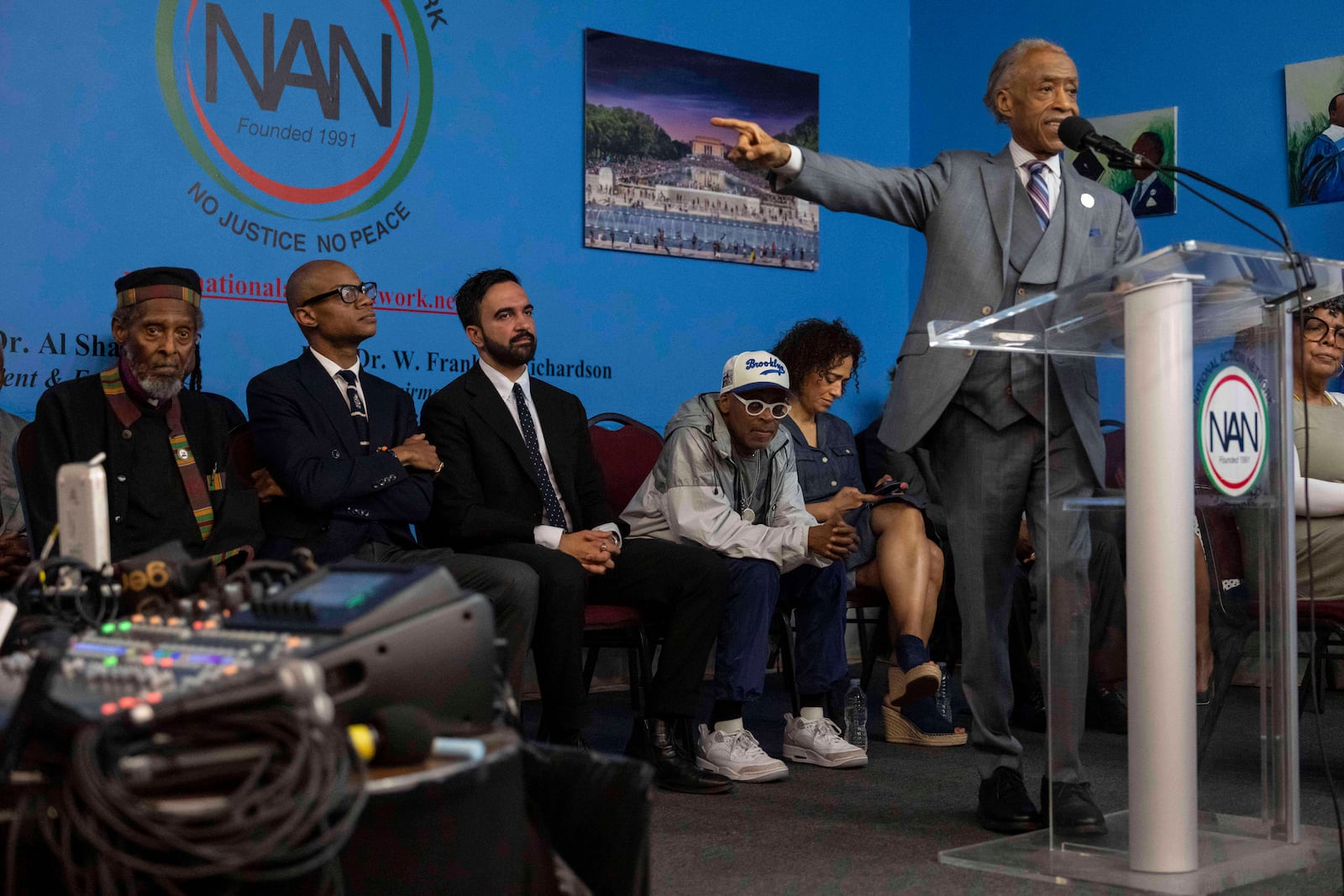 Rev. Al Sharpton, right, speaks during the National Action Network's Saturday action rally at House of Justice in Harlem, Saturday, June 28, 2025, in New York. (AP Photo/Yuki Iwamura)