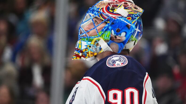 Columbus Blue Jackets goaltender Elvis Merzlikins reacts after giving up a goal to the Colorado Avalanche in the first period of an NHL hockey game Saturday, Jan. 10, 2026, in Denver. (AP Photo/David Zalubowski)