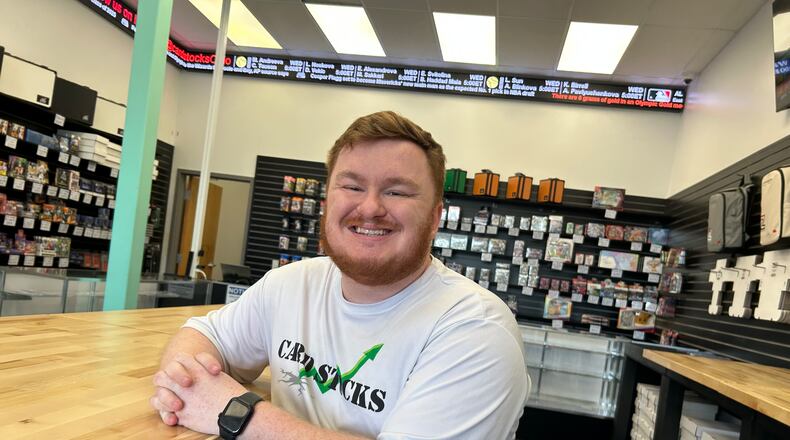 John Bauereiss, 31, of Fairfield, serves as general manager of the Card Stocks location in Monroe. The store opened two months ago. RICK McCRABB/CONTRIBUTOR
