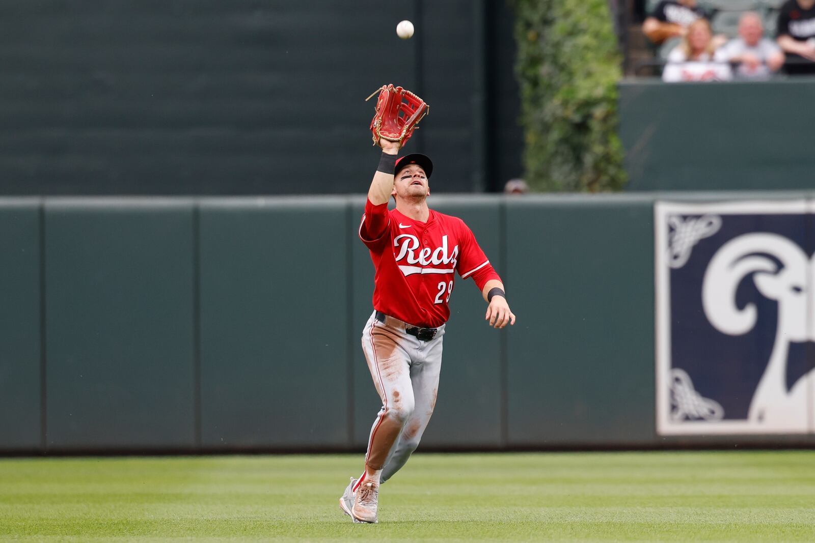 Cincinnati Reds center fielder TJ Friedl (29) catches a fly ball hit by Baltimore Orioles' Tyler O'Neil in the first inning of a baseball game Saturday, April 19, 2025, in Baltimore. (AP Photo/Alyssa Howell)