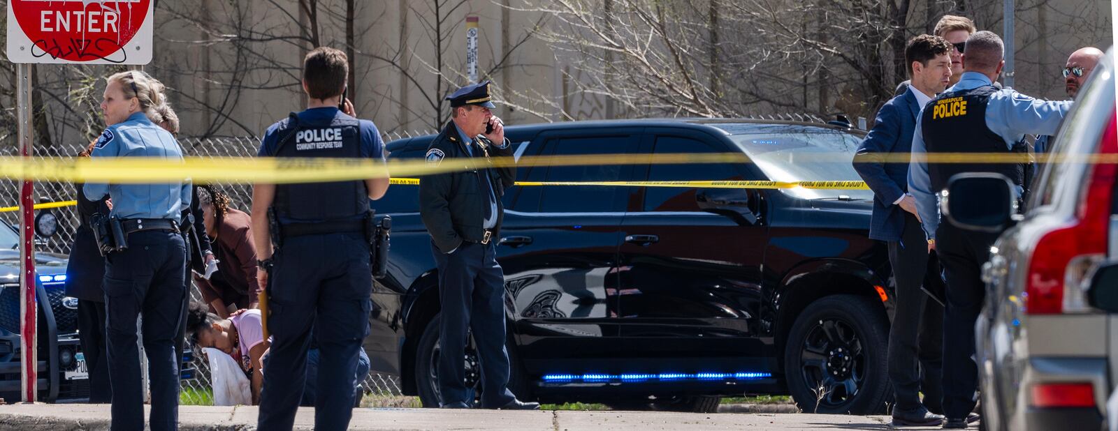 Police work on the scene as a bystander is shook up by the homicide in front of 2107 Cedar Ave S in Minneapolis, Minn., on Wednesday, April 30, 2025. (Richard Tsong-Taatarii/Star Tribune via AP)