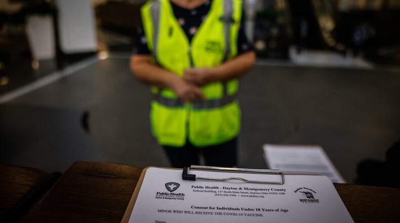 File - A COVID-19 vaccination clinic held at the Dayton Convention Center Wednesday Jan. 20, 2022. JIM NOELKER/STAFF