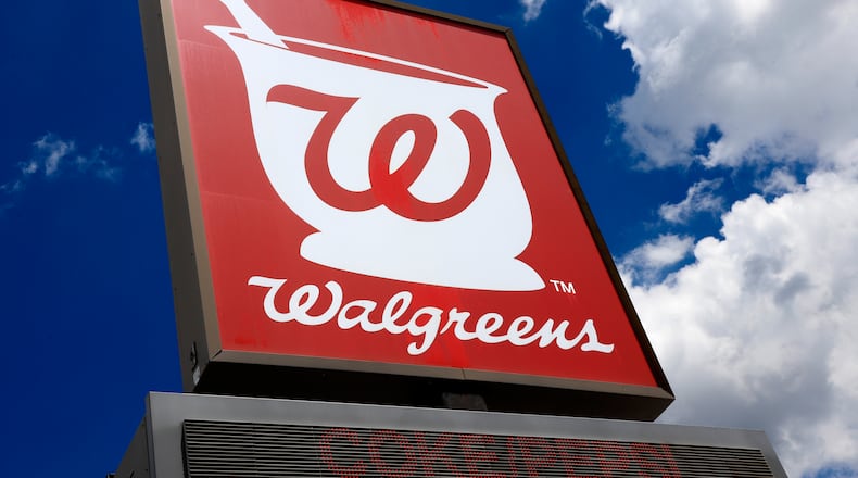 FILE - This June 25, 2019, file photo shows a sign outside a Walgreens Pharmacy in Pittsburgh. Walgreens slashed its earnings forecast for the year, Tuesday, June 27, 2023, and raised a cost-cutting goal after missing analyst profit expectations in its fiscal third quarter. (AP Photo/Gene J. Puskar, File)
