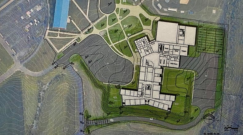 Residents of Monroe Schools got their first look at a new high school building coming to the school system’s main campus. Monroe Schools Superintendent Robert Buskirk unveiled the first aerial-view rendering of the future high school, which is tentatively scheduled to open in June 2028, during a facilities committee meeting of the Monroe school board Tuesday evening. (Provided)