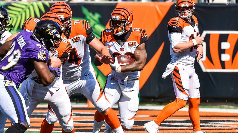 The Cincinnati Bengals running back Joe Mixon carries the ball during their 20-0 loss to the Baltimore Ravens Sunday, Sept. 10 at Paul Brown Stadium in Cincinnati. NICK GRAHAM/STAFF