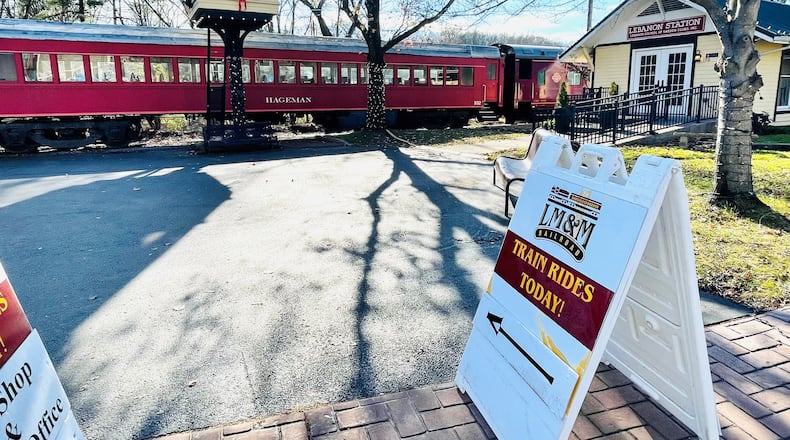 Tens of thousands of people watched the annual horse-drawn carriage parade and festival in downtown Lebanon, Ohio on Sat., Dec. 4, 2021. The LM&M Railroad was empty of passengers while the parade occurred.