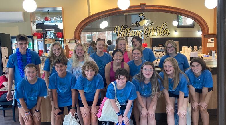 The Youth Philanthropy Committee, which is a committee of the Hamilton Community Foundation. The group of high school students issued more than $30,000 in grants in 2023 to various community organizations that support the youth. The committee is pictured at the Village Parlor on Main Street in Hamilton. PROVIDED
