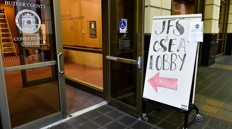 FILE PHOTO: Butler County Job and Family Services has a $889,076 contract with Pressley Ridge to help underprivileged and troubled youth succeed in the workforce. The coronavirus pandemic impacted success of the program during the pandemic. JFS and Child Support Enforcement Agency set up a makeshift office in a conference room on the ground floor of the Government Services Center in Hamilton during the pandemic. NICK GRAHAM / STAFF
