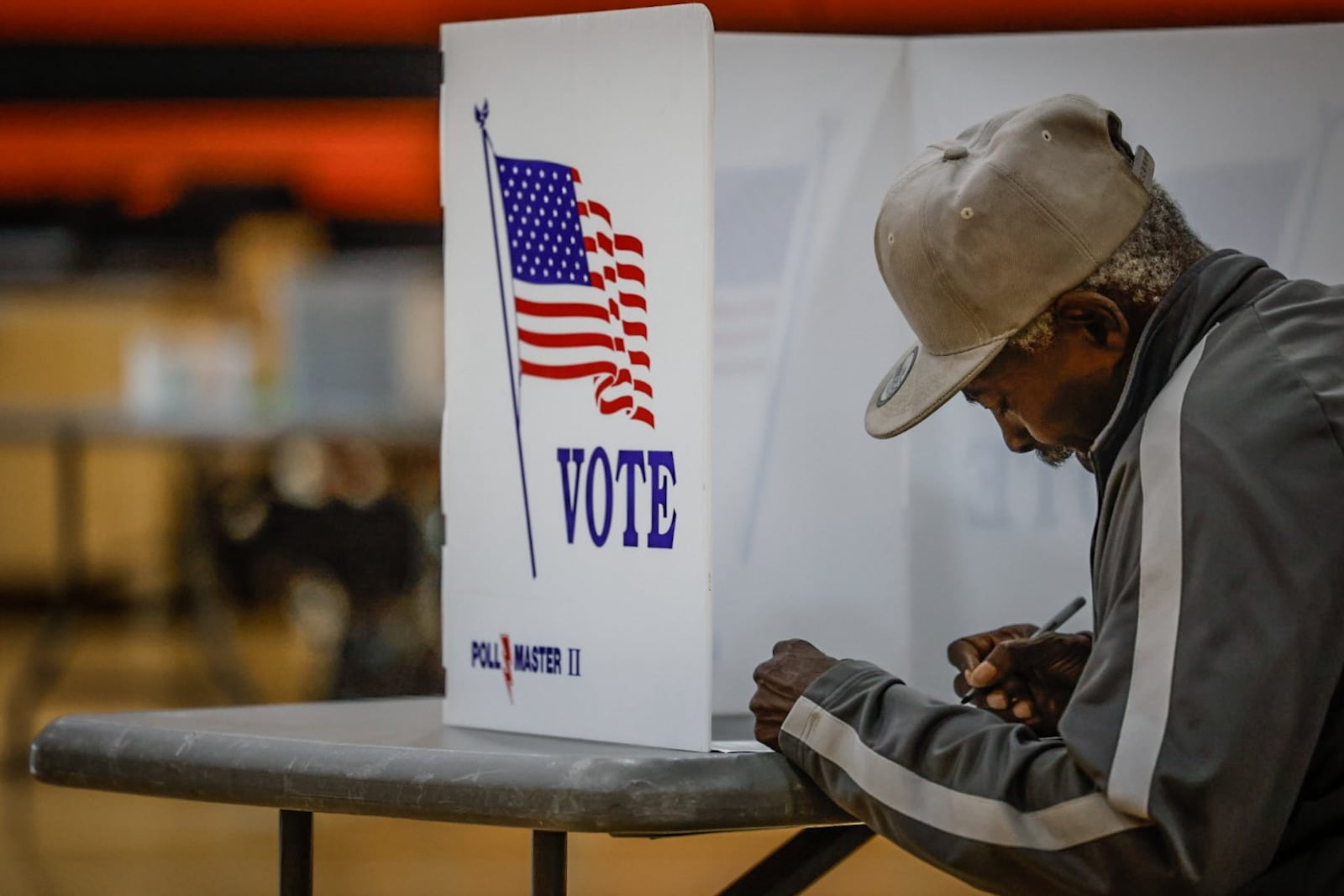 Arnold Earnest votes at Dayton's Stivers School for the Arts in the November 2024 election. Jim Noelker/Staff
