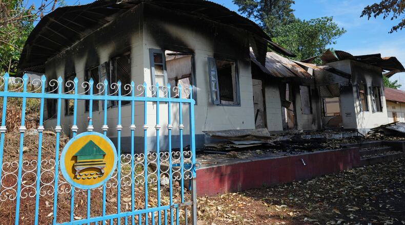 In this photo taken during a trip supervised by pro-military Myanmar media, a damaged government residence is seen in Kyaukme, northern Shan State, Myanmar, Friday, Oct. 10, 2025. (AP Photo/Aung Shine Oo)