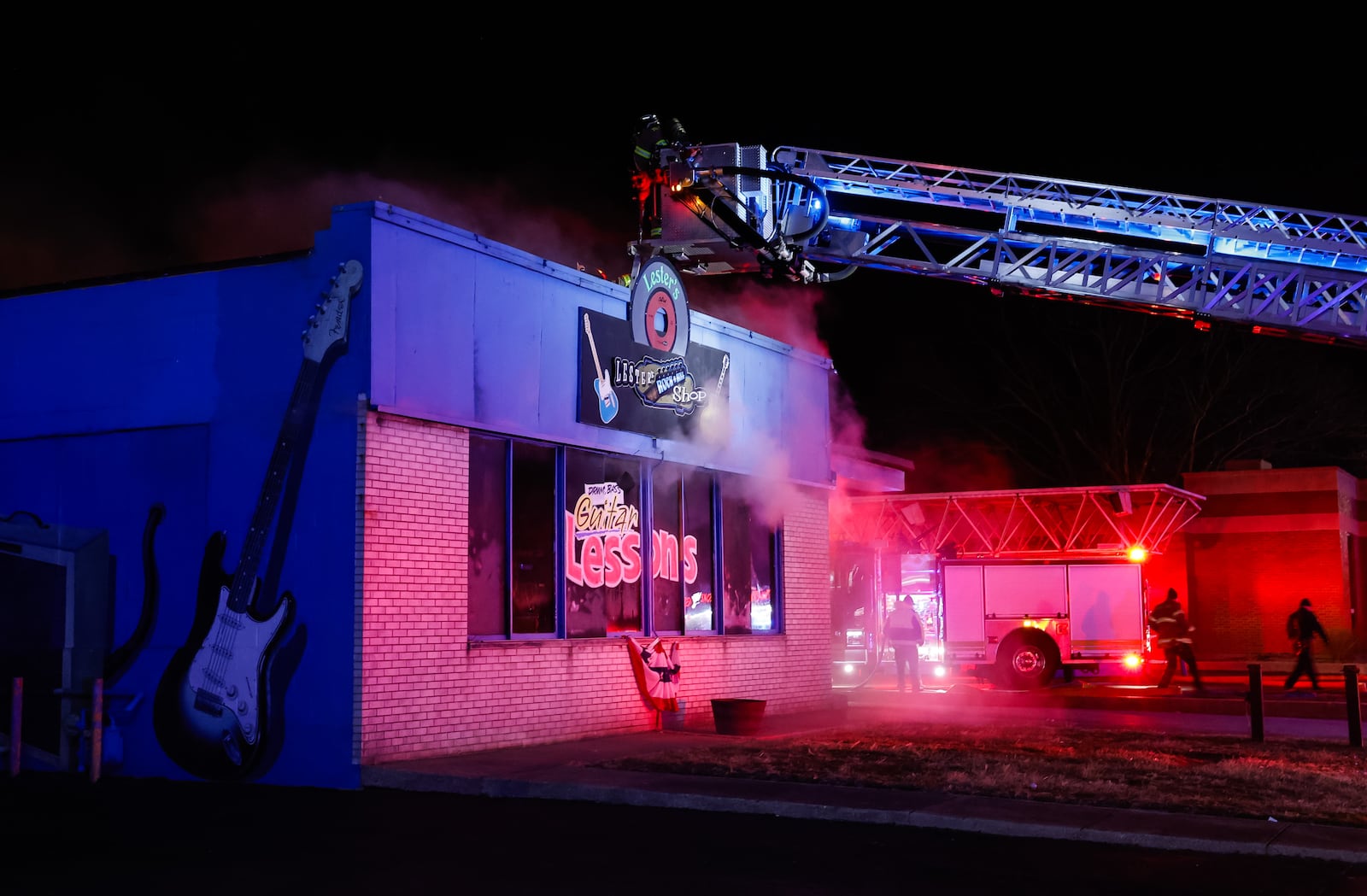 Emergency crews extinguish a fire at Lester's Rock N Roll Shop Jan. 20, 2026, on Central Avenue in Middletown. NICK GRAHAM/STAFF
