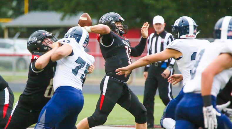 Franklin quarterback Braden White (11), shown throwing a pass against visiting Edgewood on Sept. 1, will miss the rest of the season with a knee injury. GREG LYNCH/STAFF