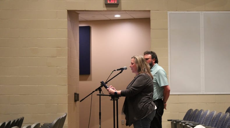 Molly Farler spoke on behalf of herself and her husband Andy Farler at a Talawanda board meeting March 26. Board member Dawn King’s Talawanda account was used to access private student information including the IEP drafts for the Farler’s children, a cybersecurity investigation by the district alleges. Photo by Sean Scott