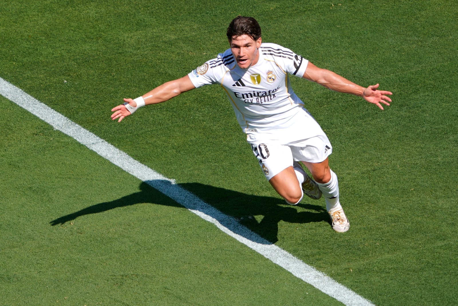 Real Madrid's Fran Garcia celebrates scoring his side's 2nd goal during the Club World Cup quarterfinal soccer match between Real Madrid and Borussia Dortmund in East Rutherford, N.J., Saturday, July 5, 2025. (AP Photo/Pamela Smith)