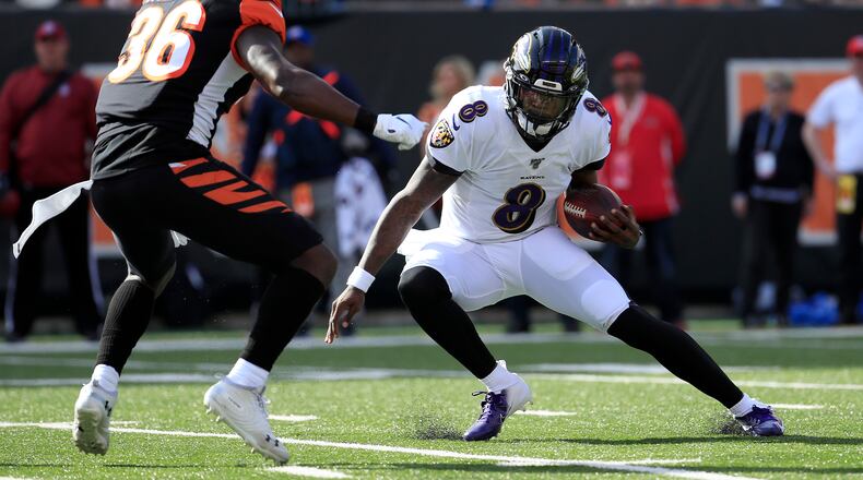 CINCINNATI, OHIO - NOVEMBER 10: Lamar Jackson #8 of the Baltimore Ravens runs with the ball during the game against the Cincinnati Bengals at Paul Brown Stadium on November 10, 2019 in Cincinnati, Ohio. (Photo by Andy Lyons/Getty Images)