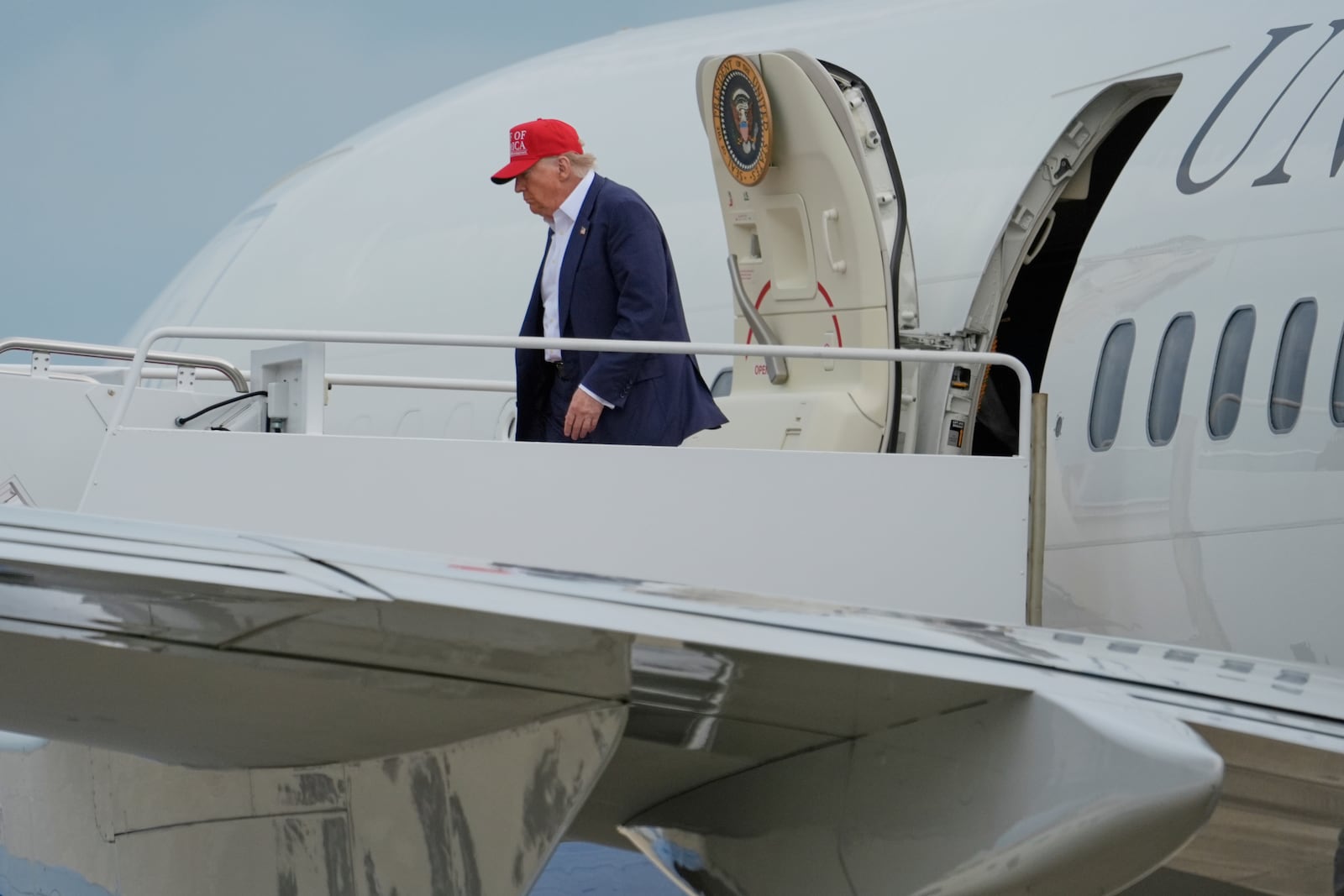 President Donald Trump arrives on Air Force One at Joint Base Andrews, Tuesday, July 1, 2025, after visiting a migrant detention center in Ochopee, Fla.. (AP Photo/Alex Brandon)