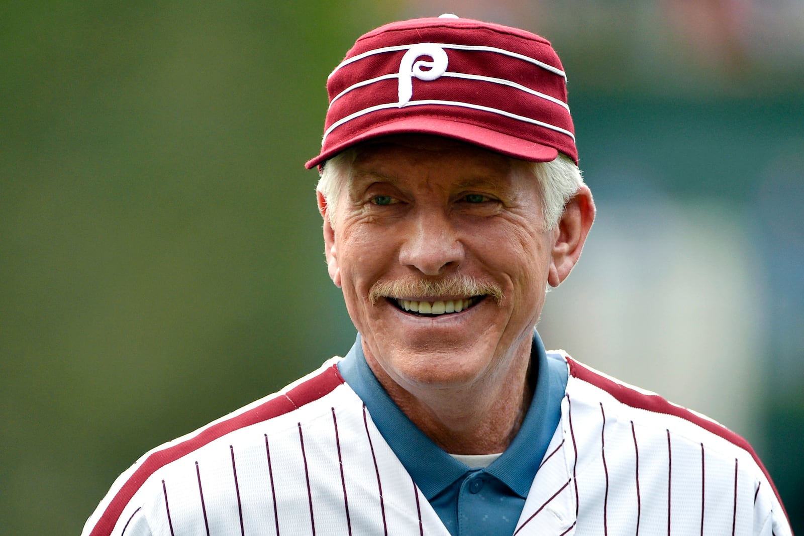 FILE- In this June 5, 2016, file photo, former Philadelphia Phillies third baseman Mike Schmidt smiles prior to a baseball game between the Phillies and the Milwaukee Brewers in Philadelphia. (AP Photo/Derik Hamilton, File)