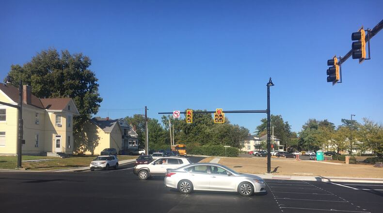 The reconfigured intersection of Main Street and Millville and Eaton avenues in Hamilton recently opened and the project is expected to cost about $3.7 million, 90 percent will be paid by the Ohio Department of Transportation. RICK McCRABB/STAFF