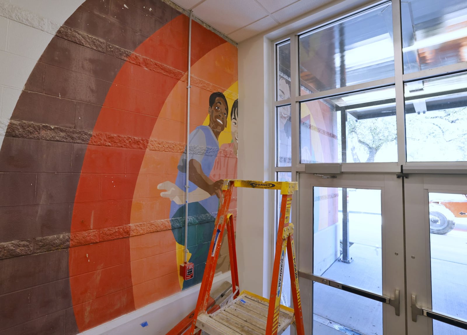 Construction is nearing completion on the expansion project at Robert "Sonny" Hill Jr. Community Center on Lafayette Ave. in Middletown. A mural once visible on the outside of the old building now bridges the gap between new and old sections. NICK GRAHAM/STAFF