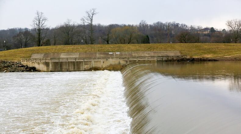 Dams like the low-level dam on the Great Miami River south of downtown Hamilton have been called “killing machines,” but a company that wants to build an electric-generating replacement for it says its product can be less dangerous, although not absolutely safe. GREG LYNCH / STAFF