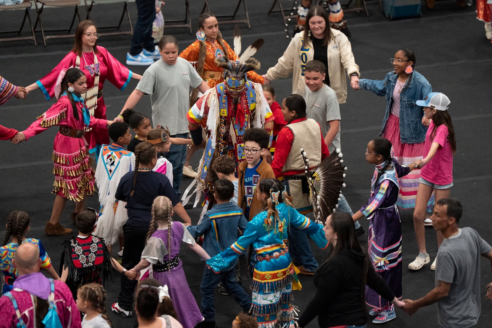 People participate during the BraveNation Powwow and Gather at UNC Pembroke, Saturday, March 22, 2025, in Pembroke, N.C. (AP Photo/Allison Joyce)