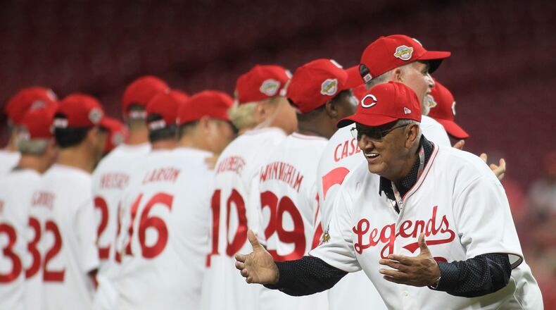 Dave Concepcion talks to members of the other team during pregame introductions before the Cincinnati Reds Legends Game on Friday, Aug. 27, 2021, at Great American Ball in Cincinnati. David Jablonski/Staff