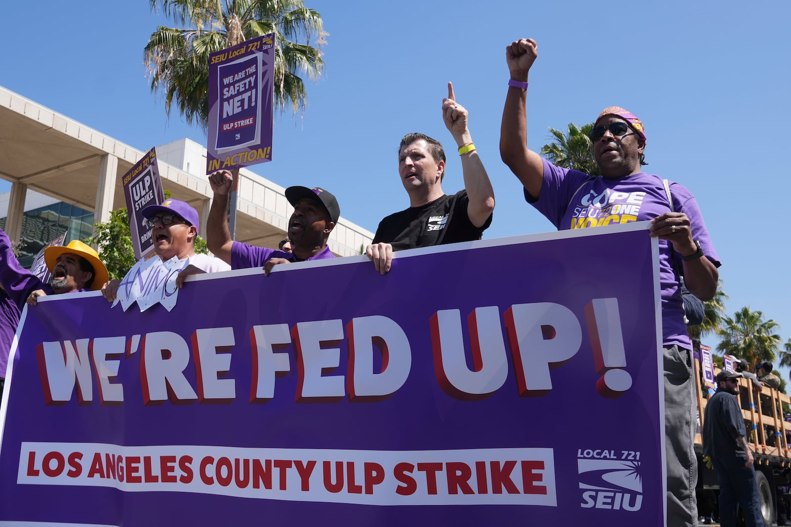 Los Angeles County workers rally to demand higher wages Tuesday, April 29, 2025, in Los Angeles. (AP Photo/Damian Dovarganes)