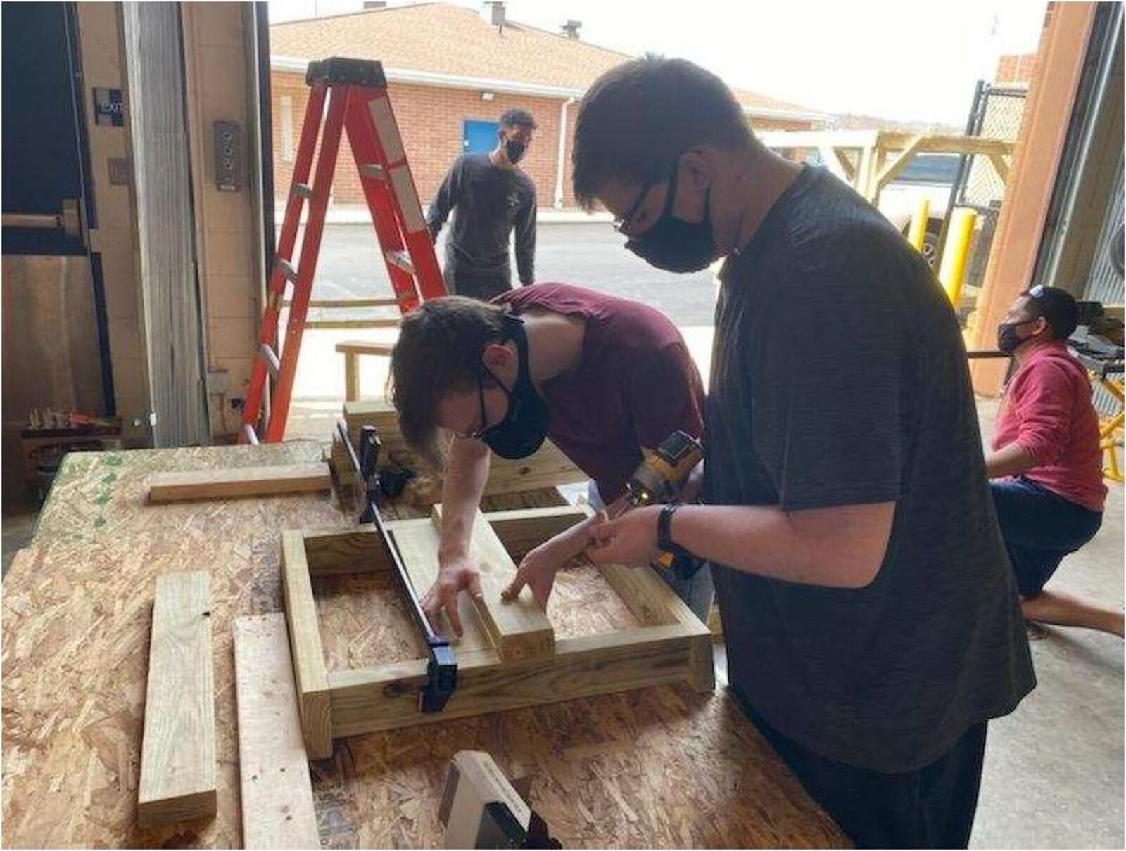 Students from Butler Tech's carpentry program at Hamilton High School created flower planters and other decorations for the outdoor area at The Benison event center and co-working space downtown. PROVIDED
